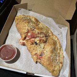 Dino's Pizza - New York, Philly, Dino's. There's the top three places to get a good pie (or crazone).   You won't be disappointed.   5/5