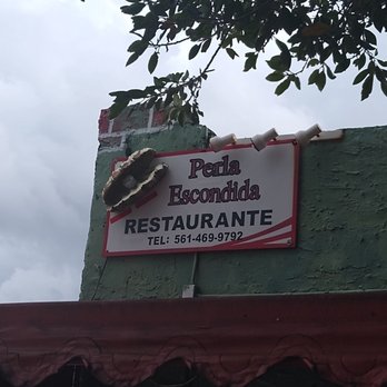 Perla Escondida - a sign for a restaurant - Mexican Near Me - Lake Worth, Florida