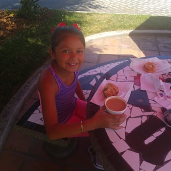 Drinx - Enjoying her decaf coffee and chocolate chip muffin. - Coffee & Tea Near Me - Downey, California