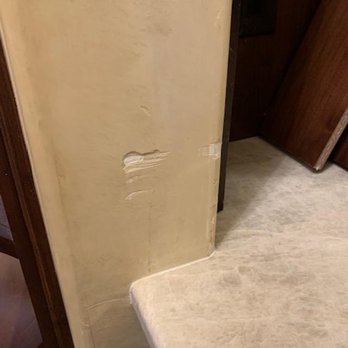 Posh Floors - holes in wall made while removing granite - Flooring Near Me - Bee Cave, Texas