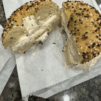 Fuhgedaboudit Bagel - Toasted everything bagel with lox cream cheese schmear. - Bagels Near Me - Spring, Texas