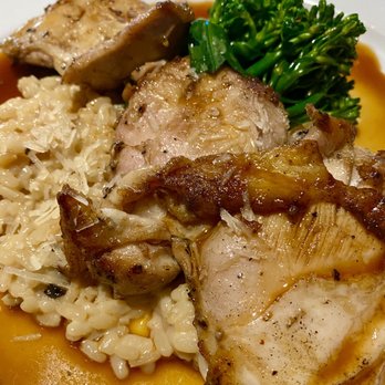The Spott - Crispy Chicken Thighs with Mushroom Risotto and Broccolini - New American Near Me - New Smyrna Beach, Florida The Spott - Crispy Chicken Thighs with Mushroom Risotto and Broccolini - New American Near Me - New Smyrna Beach, Florida