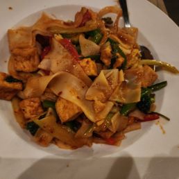 a plate of stir fried noodles