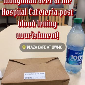 UWMC Plaza Cafe - Clean sanitized tables spaced well apart, water in 100% recycled plastic bottles and a box of Mongolian BBQ beef, rice and lots of broccoli. - Cafeteria Near Me - Seattle, Washington