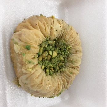 Al Sultan Restaurant - a pastry in a paper container - Halal Near Me - Mesa, Arizona