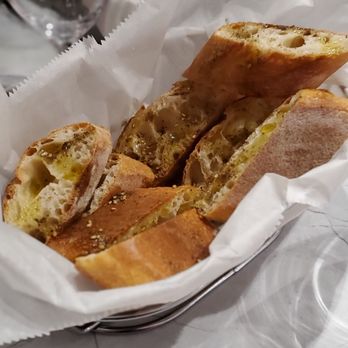 Carpaccio - Complimentary oil drizzled bread. - Italian Near Me - East Rutherford, New Jersey
