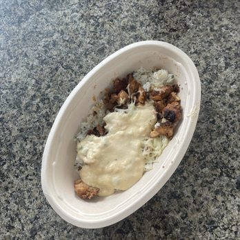 Chipotle Mexican Grill - Bowl with white rice, queso, chicken, cheese, and guac. - Fast Food Near Me - Glen Mills, Pennsylvania