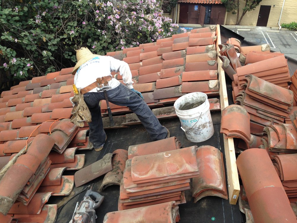 Slide of JW Roofing Services