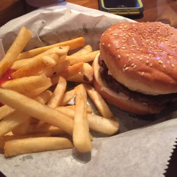 Wagon Wheel - a hamburger and fries in a basket - New American Near Me - Bessemer, Alabama Wagon Wheel - a hamburger and fries in a basket - New American Near Me - Bessemer, Alabama