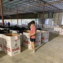 The Marine Toys For Tots Foundation Orlando - The toy bags are sorted into bins by age and boy/girl.