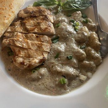 Tailgaters Bar & Grill - Grilled chicken with a creamy mushroom sauce over gnocchi - Sports Bars Near Me - Selah, Washington Tailgaters Bar & Grill - Grilled chicken with a creamy mushroom sauce over gnocchi - Sports Bars Near Me - Selah, Washington