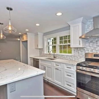 Quartz and Granite Pro - a kitchen with stainless steel appliances - General Contractors Near Me - South Easton, Massachusetts Quartz and Granite Pro - a kitchen with stainless steel appliances - General Contractors Near Me - South Easton, Massachusetts