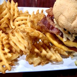 Anglers Bar & Grill - Double BBQ Cheeseburger(6 pieces of bacon, sweet bbq sauce and 3 pieces of cheese! Don't tell my doctor!!) with waffle fries & sour cream.
