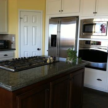 Lonnie Smith Construction - a kitchen with stainless steel appliances - General Contractors Near Me - Temecula, California