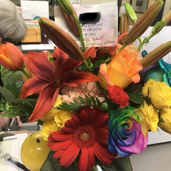 Every Bloom'n Thing - This is the "$90" bouquet. Roses, daisies, a couple tulips and lilies, and a bunch of filler carnations. - Wedding Planning Near Me - Redmond, Oregon