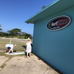 Surf Zone Surf & Skate - waxing up at the shop