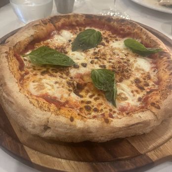 Grappolo Cucina Italiana - Delicious margherita pizza - simple ingredients and complex flavor of the sauce - Italian Near Me - Winter Park, Florida Grappolo Cucina Italiana - Delicious margherita pizza - simple ingredients and complex flavor of the sauce - Italian Near Me - Winter Park, Florida