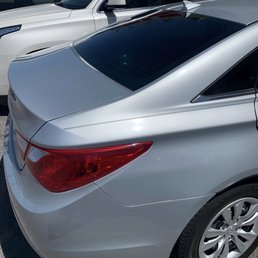View of the rear window after taking off and replacing the old tint material. View of the rear window after taking off and replacing the old tint material.