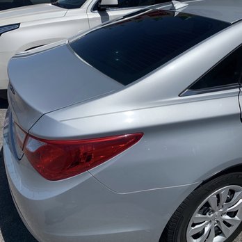 Total Eclipse - View of the rear window after taking off and replacing the old tint material. - Auto Glass Services Near Me - Las Vegas, Nevada Total Eclipse - View of the rear window after taking off and replacing the old tint material. - Auto Glass Services Near Me - Las Vegas, Nevada