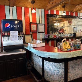 Brandin' Iron Steakhouse - bar with a large mirror - Steakhouses Near Me - Pine Valley, Utah Brandin' Iron Steakhouse - bar with a large mirror - Steakhouses Near Me - Pine Valley, Utah