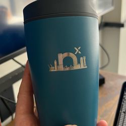 Custom laser engraving on an Owala cup.