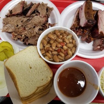 Heavy's Barbeque - Family meal with brisket, ribs, beans and potato salad - Barbeque Near Me - Hondo, Texas
