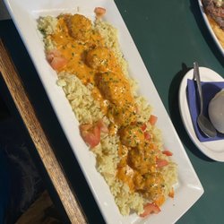 Somewhere Else Tavern - Scallops over rice-meh rice was better than the craved scallops