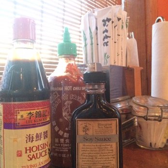 Mopho - Condiment selection. Pretty cool that the pho spoons are available in that metal container. Nifty. - Vietnamese Near Me - New Orleans, Louisiana Mopho - Condiment selection. Pretty cool that the pho spoons are available in that metal container. Nifty. - Vietnamese Near Me - New Orleans, Louisiana