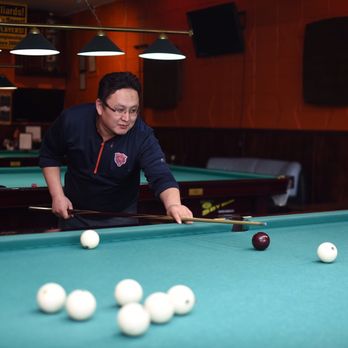 Russian billards - a man playing pool - Pool Halls Near Me - Chicago, Illinois Russian billards - a man playing pool - Pool Halls Near Me - Chicago, Illinois