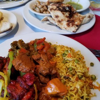 Indian Delight - Plateful of yumminess! Vegetable biryani, tandoori chicken, lamb vindaloo, batura and naan. - Indian Near Me - Catonsville, Maryland Indian Delight - Plateful of yumminess! Vegetable biryani, tandoori chicken, lamb vindaloo, batura and naan. - Indian Near Me - Catonsville, Maryland