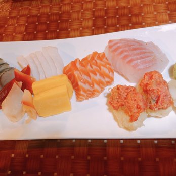 Nagomi - From left to right: mackerel, red clam, white tuna, egg custard, salmon, red snapper, spicy tuna sushi. - Sushi Bars Near Me - Glenside, Pennsylvania Nagomi - From left to right: mackerel, red clam, white tuna, egg custard, salmon, red snapper, spicy tuna sushi. - Sushi Bars Near Me - Glenside, Pennsylvania