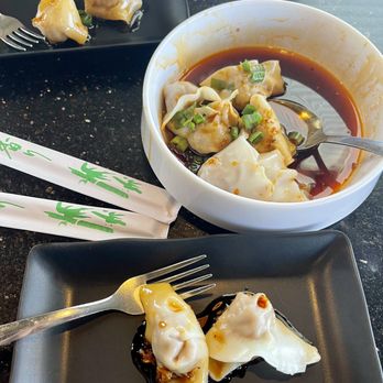 Chilispot - Spicy pork dumplings - Szechuan Near Me - University City, Missouri Chilispot - Spicy pork dumplings - Szechuan Near Me - University City, Missouri