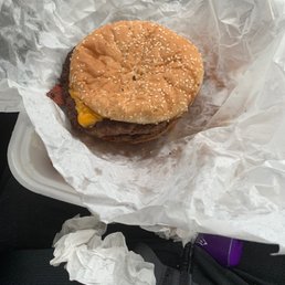 a hamburger wrapped in paper a hamburger wrapped in paper