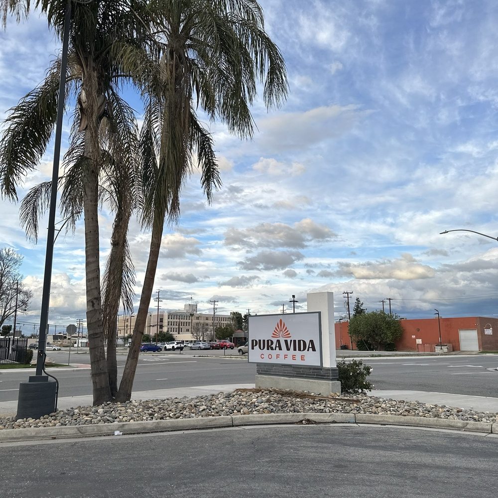 Pura Vida Coffee - a palm tree in the foreground - Coffee & Tea Near Me - Bakersfield, California Pura Vida Coffee - a palm tree in the foreground - Coffee & Tea Near Me - Bakersfield, California