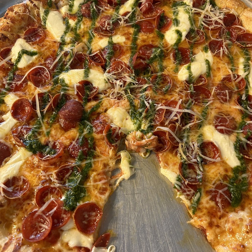 Mazza Pizzeria - Super Pepperoni pizza - chef's special - hot honey, pesto, Parmesan, mozzarella. 10/10!! A little over $40 for a large (8 slices) - Pizza Near Me - Doral, Florida