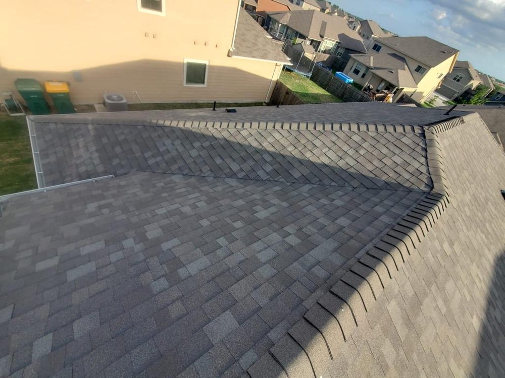 Slide of A & J Quality Roofing