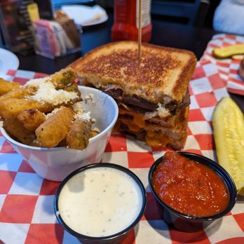 Teakwoods Bar vs Grill - a grilled cheese sandwich with fries and a pickle - Sports Bars Near Me - Pawleys Island, South Carolina Teakwoods Bar vs Grill - a grilled cheese sandwich with fries and a pickle - Sports Bars Near Me - Pawleys Island, South Carolina