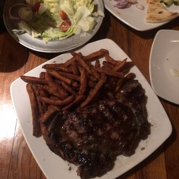 Feeney's Restaurant and Bar - Ribeye and sweet potato fries - Bars Near Me - Phoenix, Arizona