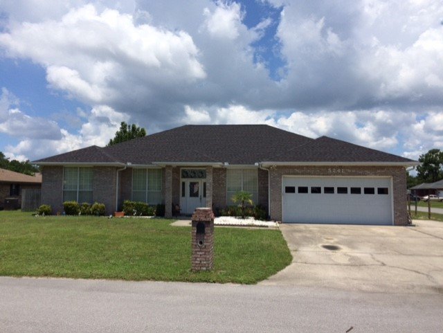 Slide of Greg's Roofing Of Bay County