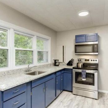McKenzie & Sons - Kitchen with granite and wall hung an ordinary microwave with cabinet for modern style and max counter space - Plumbing Near Me - Upper Marlboro, Maryland McKenzie & Sons - Kitchen with granite and wall hung an ordinary microwave with cabinet for modern style and max counter space - Plumbing Near Me - Upper Marlboro, Maryland