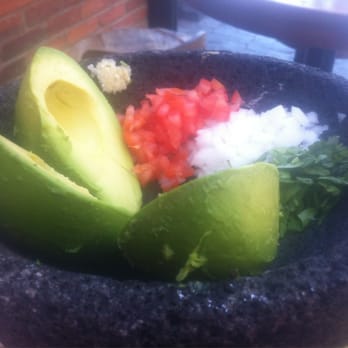 Añejo Restaurant - Guacamole pre table side mixing - Mexican Near Me - Calgary, Alberta