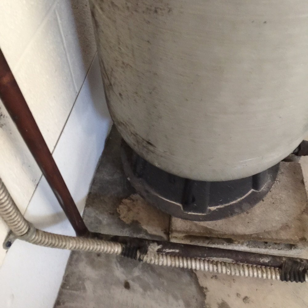 Pioneer Basement Waterproofing - Picture of water tank base. Left unstable by pioneer. - Waterproofing Near Me - Akron, Ohio Pioneer Basement Waterproofing - Picture of water tank base. Left unstable by pioneer. - Waterproofing Near Me - Akron, Ohio