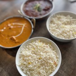Butter chicken and rice... and lamb vindallo spicyyy