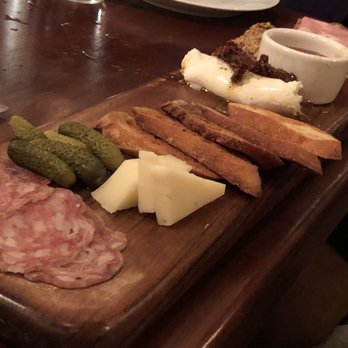Pizzeria Seven Twelve - Charcuterie board. Three meats, three cheeses, baby pickles, honey, mustard, and toasted baguette slices. - Pizza Near Me - Orem, Utah Pizzeria Seven Twelve - Charcuterie board. Three meats, three cheeses, baby pickles, honey, mustard, and toasted baguette slices. - Pizza Near Me - Orem, Utah
