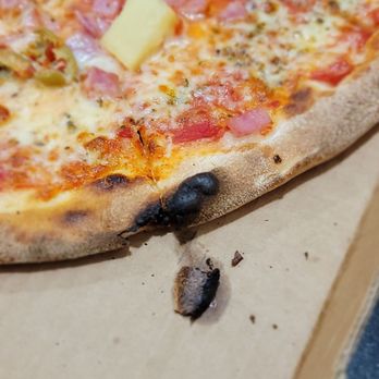 Angelo's Pizza - Hard burn on hand thrown sparse topping pizza - Pizza Near Me - Tavares, Florida Angelo's Pizza - Hard burn on hand thrown sparse topping pizza - Pizza Near Me - Tavares, Florida