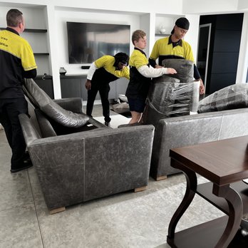 Ted's Moving - Taking time to carefully wrap each cushion before packing!!! - Movers Near Me Ted's Moving - Taking time to carefully wrap each cushion before packing!!! - Movers Near Me