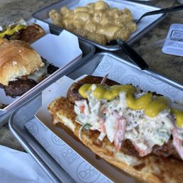 three trays of food on a table