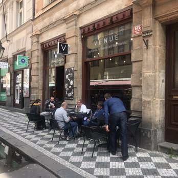 Venue - Outdoor seating an A+ so you can enjoy the view of the street market. - Bars Near Me - Prague, Puerto Rico