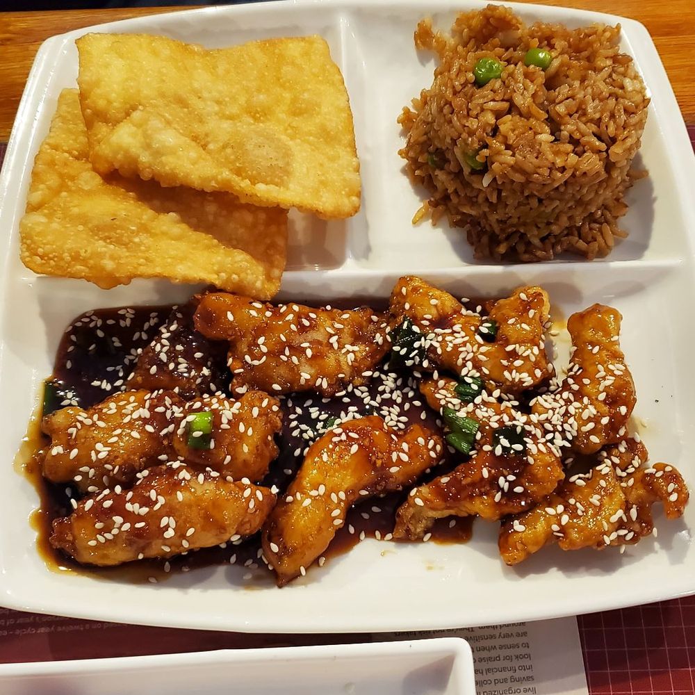 Hunan Restaurant - Sesame chicken with fried rice and fried wonton. - Chinese Near Me - Eureka, California Hunan Restaurant - Sesame chicken with fried rice and fried wonton. - Chinese Near Me - Eureka, California