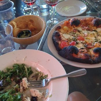 Cass Winery - This is the woodfire margarita pizza and the chicken salad (which I had eaten half already) - Wineries Near Me - Paso Robles, California